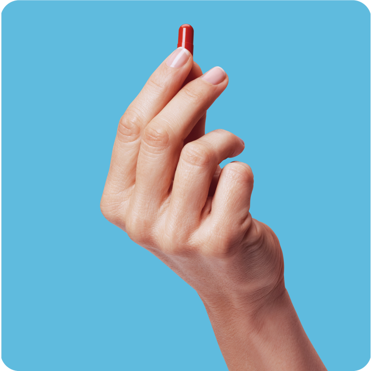 Hand holding medication, Picture