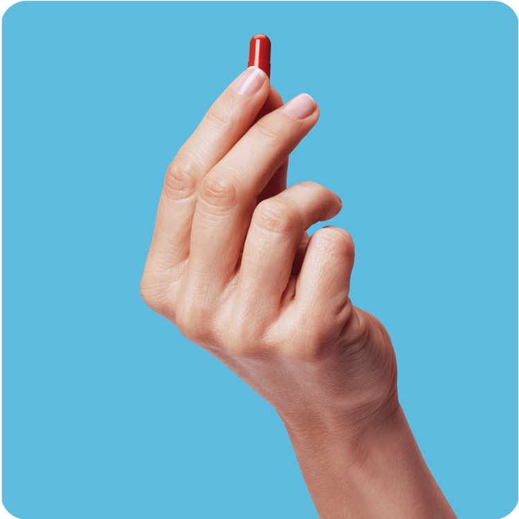 Hand holding medication, Picture