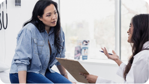 a doctor discusses migraine diagnosis with patient